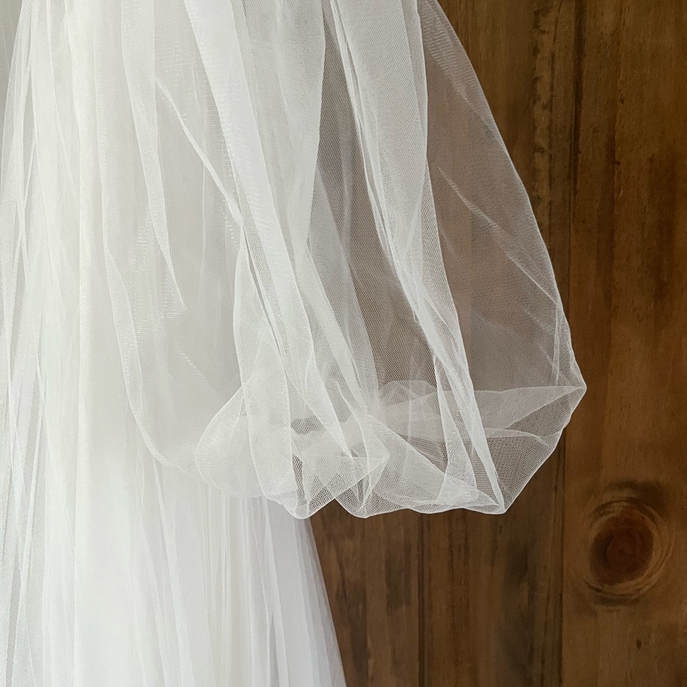 White Strapless Gown with Sheer Sleeves - Picture 2 of 6